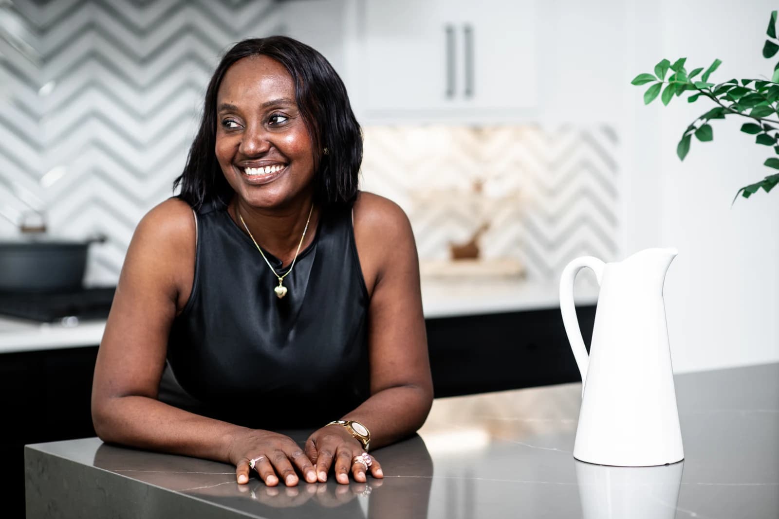 Esther Atere at a kitchen island